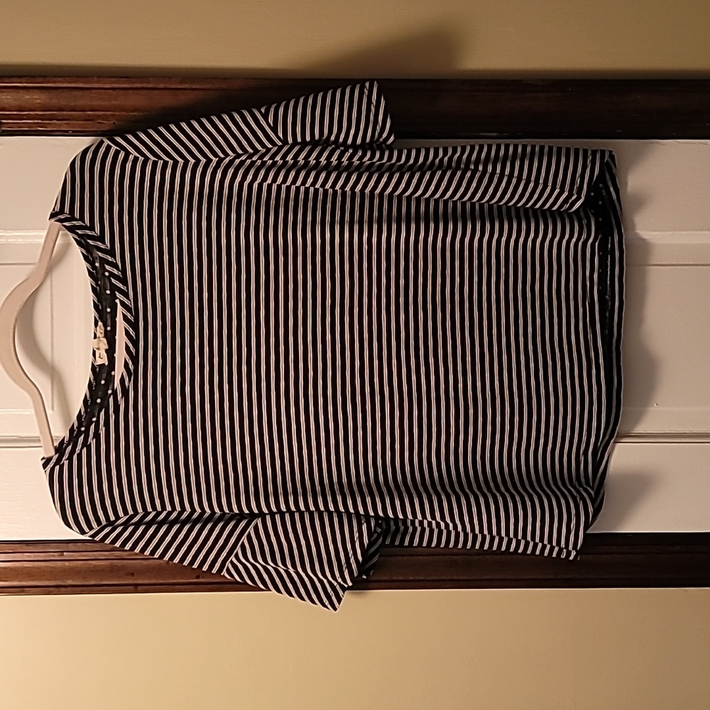 Short sleeve top.  Ruffle sleeve